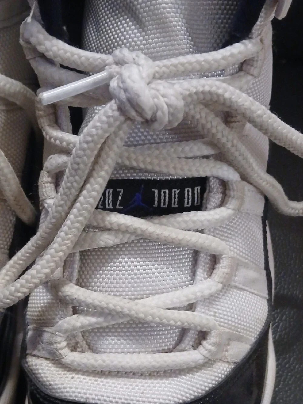 Kids White and Black Jordan High-Top Sneakers